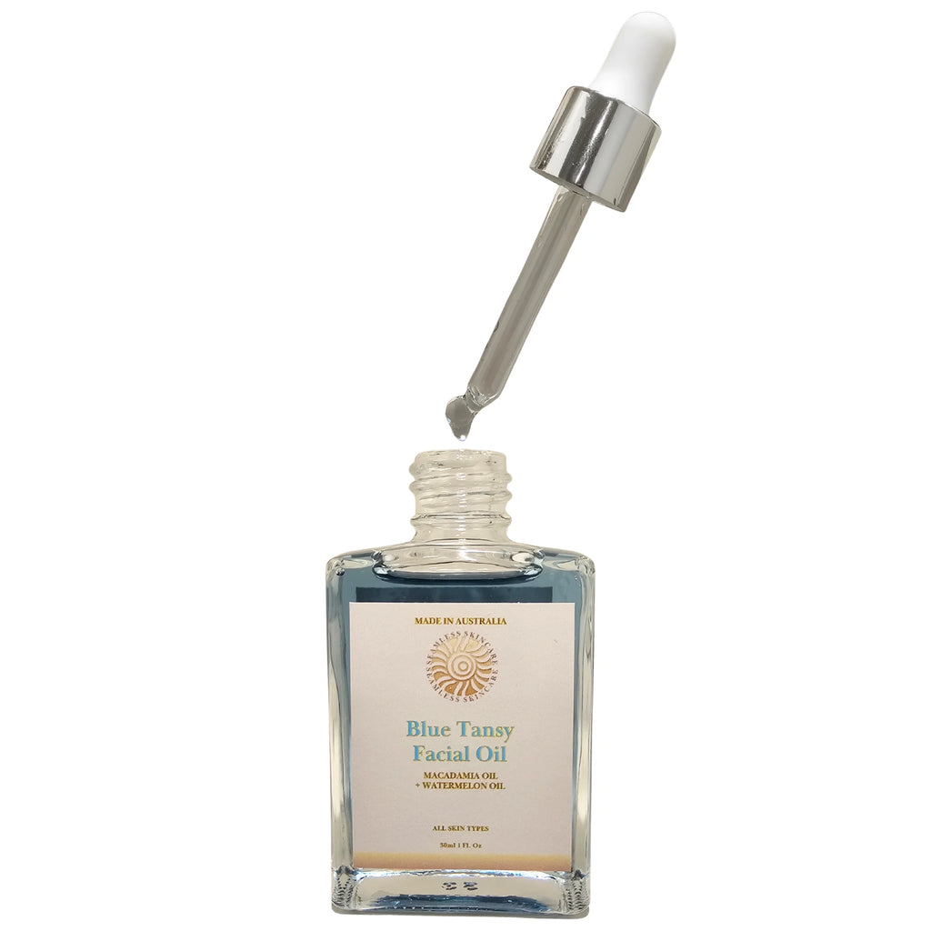 Blue Tansy Facial Oil with dropper on a white background