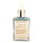 Back of Blue Tansy Facial Oil bottle on a white background