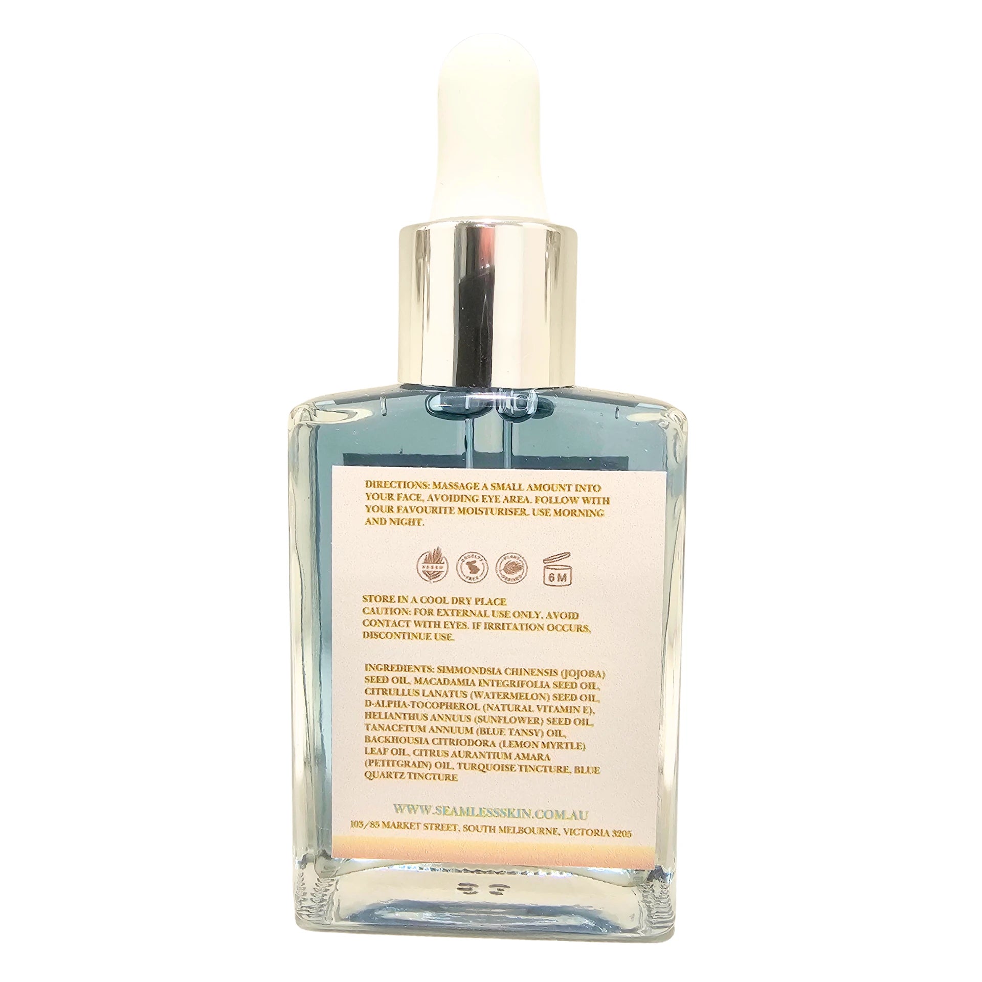 Back of Blue Tansy Facial Oil bottle on a white background
