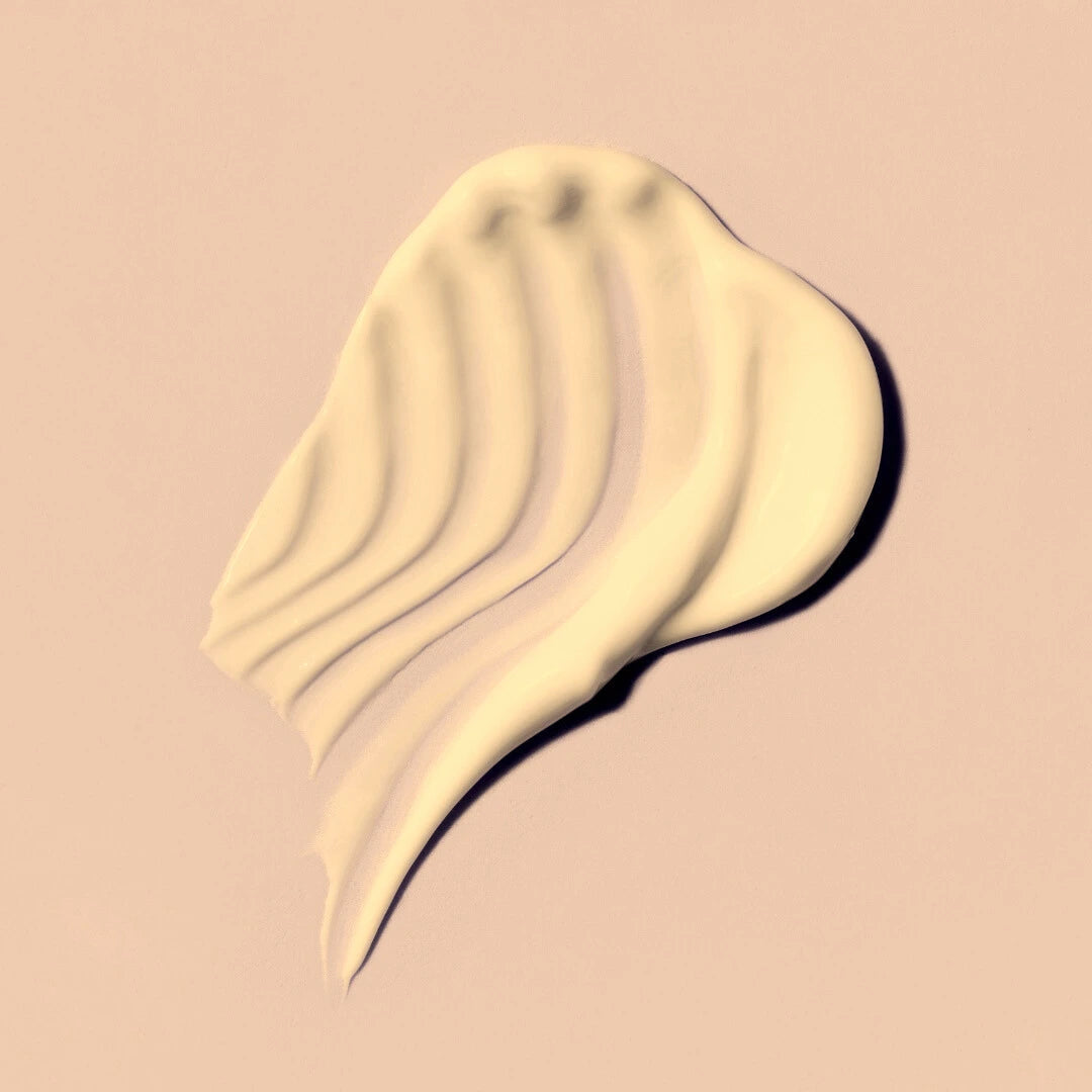 Light Moisturiser swatch on a beige background