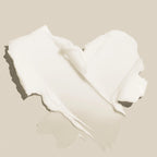 Swatch of Lush Cream Cleanser on a beige background