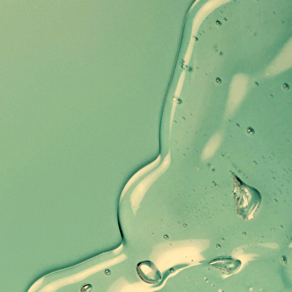 Nature's Enzyme Cleanser on green background