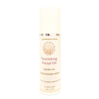 Nourishing Facial Oil pump with branding on a white background